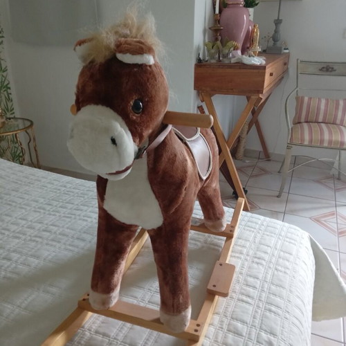Retro rocking horse toy used with wooden details
