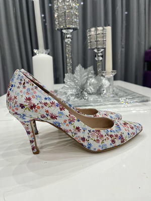 Alexandra Paggioti leather pumps used with colorful floral print