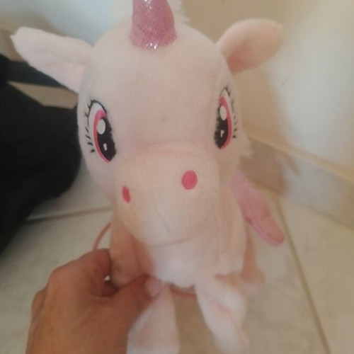 Mechanical unicorn like new, functional walking toy