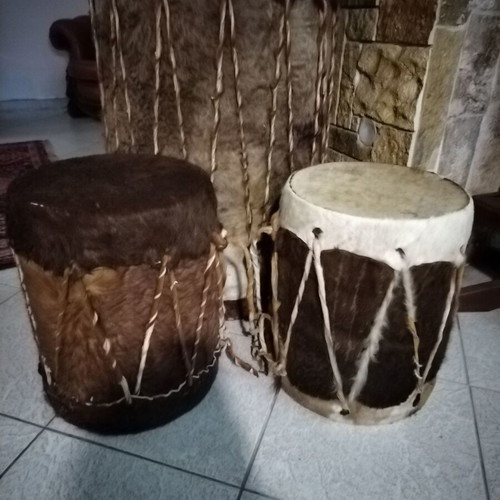 African collectible drums like new, one large and two small