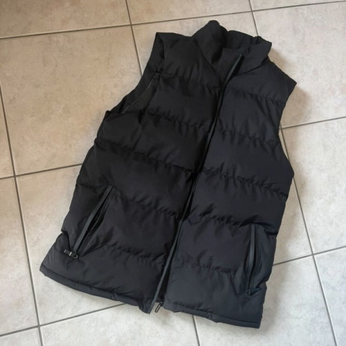 Black sleeveless vest, size XS