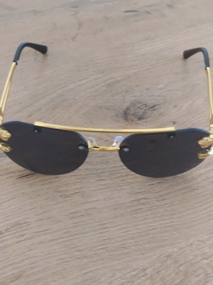 Women's sunglasses, black and gold, new with case