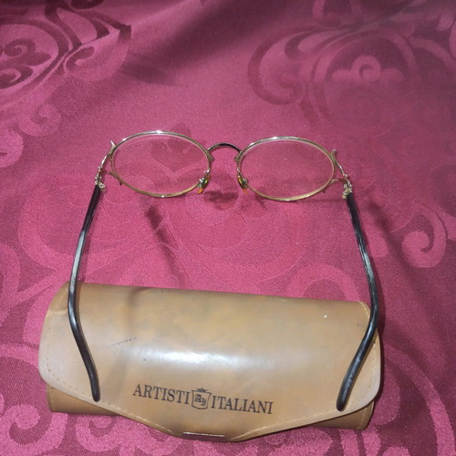 Eyeglass frame used, black and gold, with Artisti Italiani case