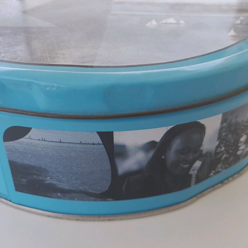 Maersk metal biscuit tin used with some dents