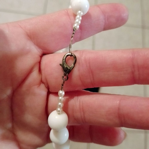 Handmade necklace with white pearls and bone charm used