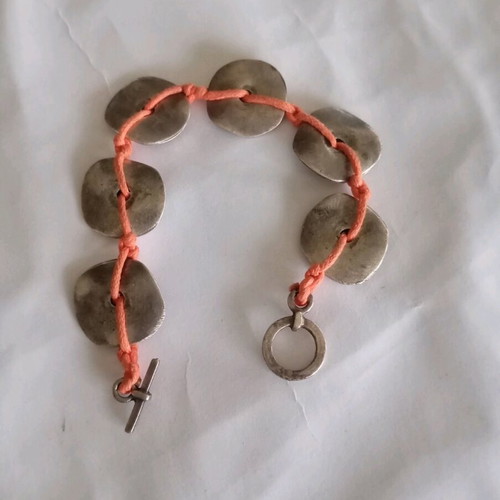 Handmade bracelet with orange cord