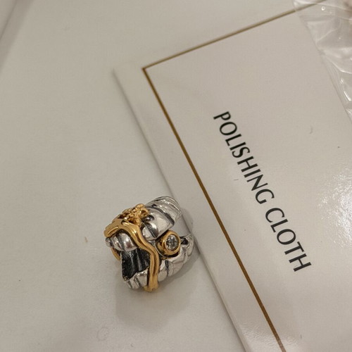 Pandora Ariel shell charm with diamond symbol