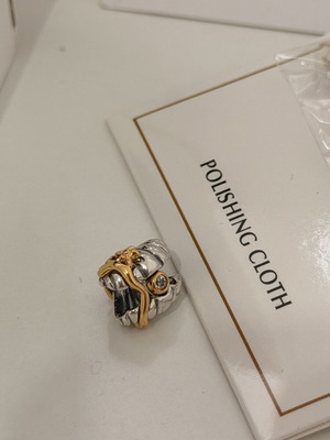 Pandora Ariel shell charm with diamond symbol