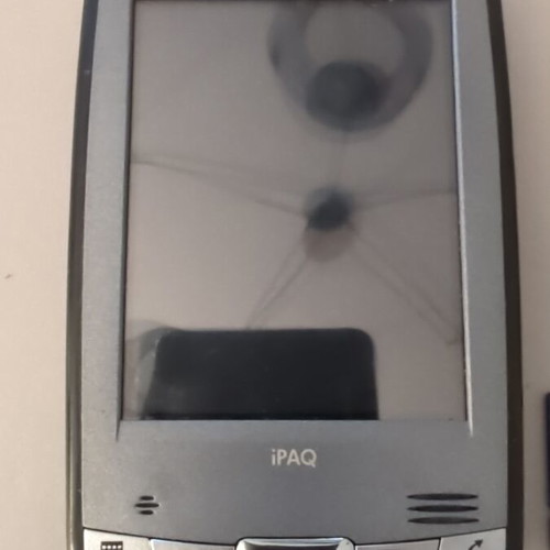 HP iPAQ HX2490b PDA used with charging dock and accessories