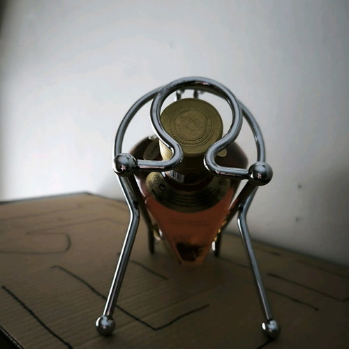 Bottle holder for wine and liqueur, like new, metal