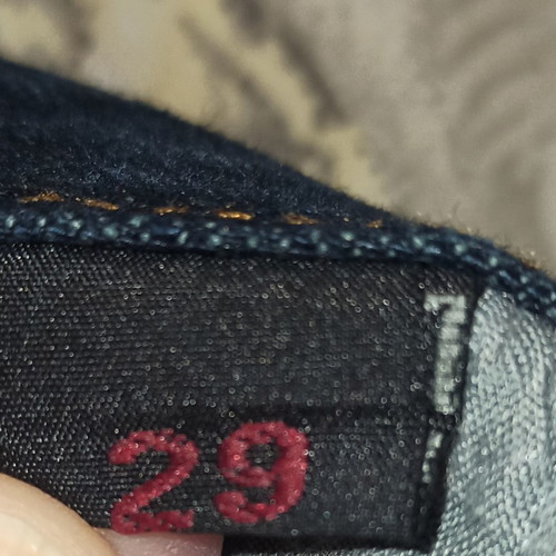 Lynne denim jeans used with rips and pink sequins, size 29