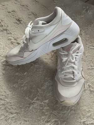 Nike Air sports shoes used, white with pink details
