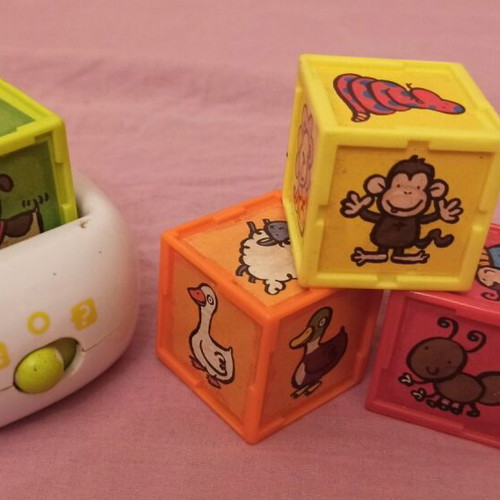 Educational toy set like new with learning board, dragon figure, animal cubes, and Nemo truck