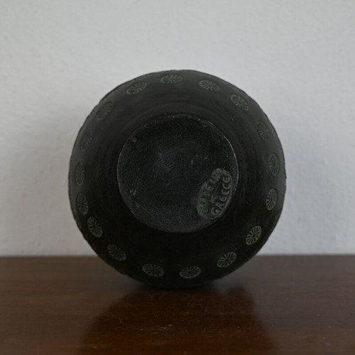 Decorative ceramic vase in ancient style with geometric motifs
