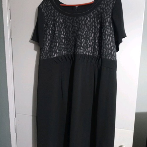 Women's black dress with short sleeves and copper details size 54 like new