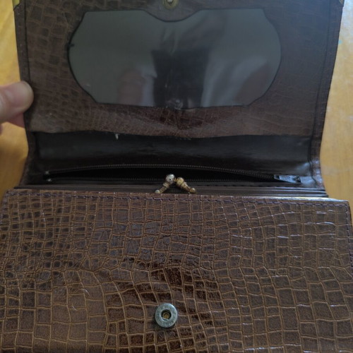 Long vintage brown leather wallet with crocodile pattern and metal corners