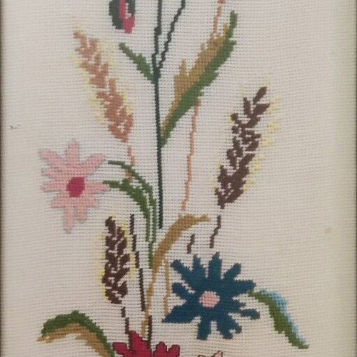 Decorative textile painting with handmade embroidery used, flowers