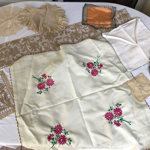 Set of various embroidered linens used with minor imperfections