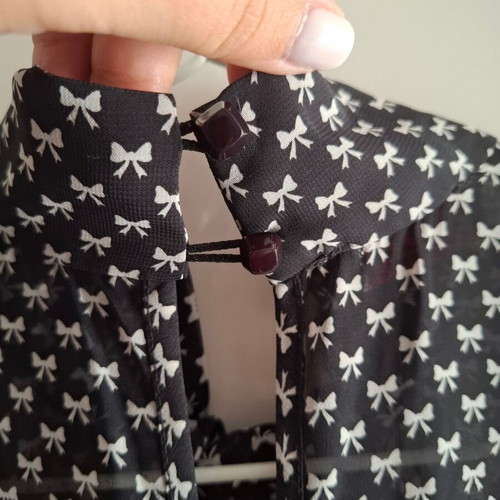 Bellino semi-transparent top with bows size L/XL like new