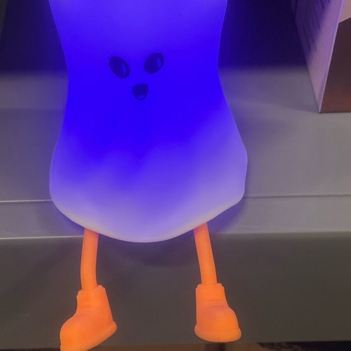 Silicone ghost night light with adjustable brightness and orange feet