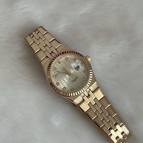 Women's watch new with gold details
