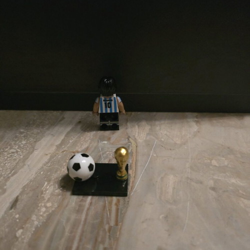Diego Maradona collectible figure with World Cup trophy like new