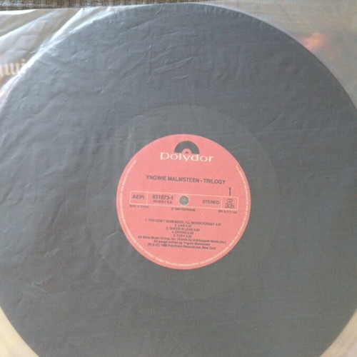 Trilogy Yngwie Malmsteen record used, metal