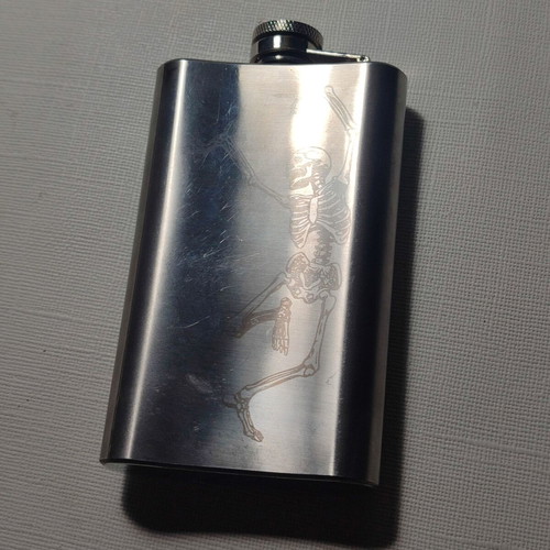 Metal flask used with laser graphics