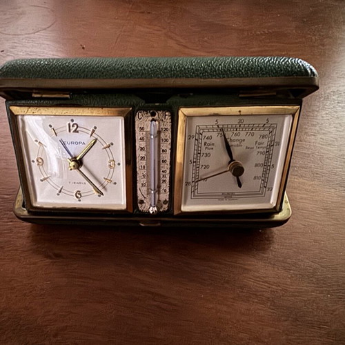 Vintage Europa travel clock with thermometer and barometer used