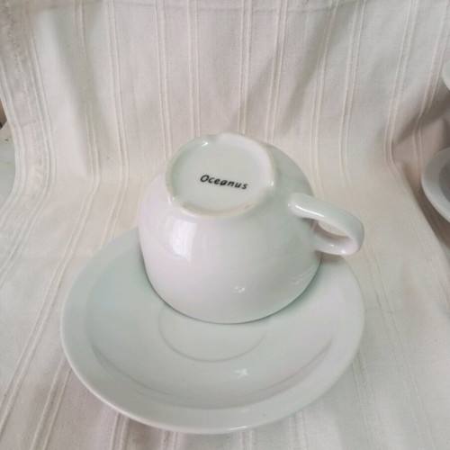 Set of 6 used French coffee or tea porcelain cups with saucers