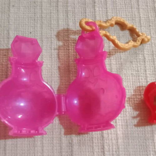 Mini doll in lantern like new, plastic