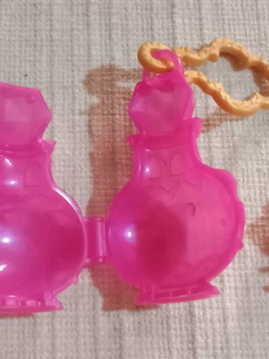 Mini doll in lantern like new, plastic