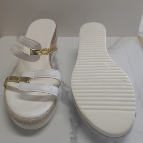 Women's sandals new with white straps and gold platform details