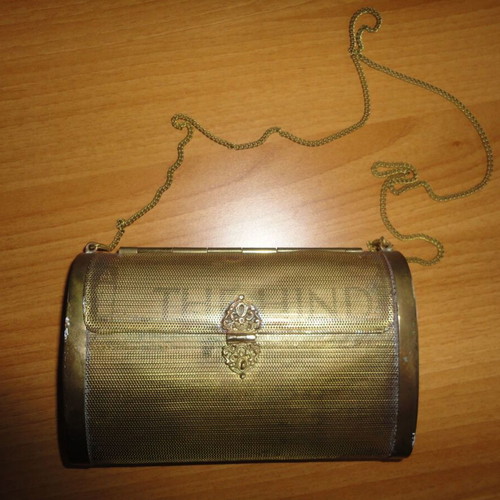 The Hind antique bag used, early 20th century, brass with plush interior