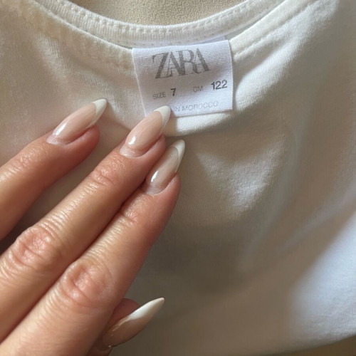 Zara girls' bodysuit in white, like new