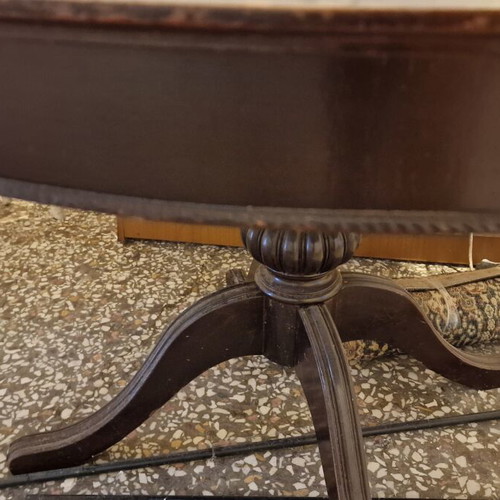 Wooden round extendable table used with pedestal base