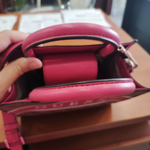 Guess handbag like new, fuchsia color with extra strap