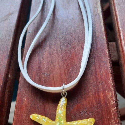 Handmade starfish pendant necklace with white cord, yellow iridescent