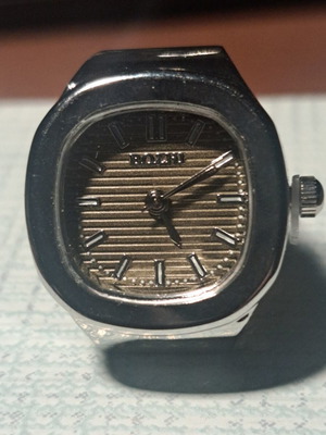 Ring watch with khaki dial and silver bracelet like new