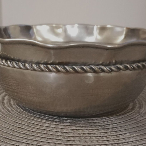 Metal decorative item used with perimeter detail