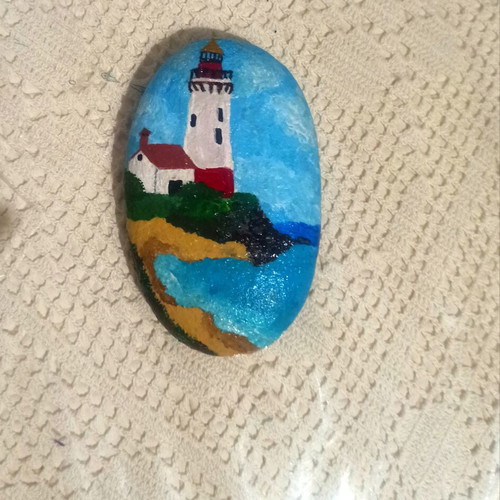Hand-painted lighthouse stone with acrylic colors