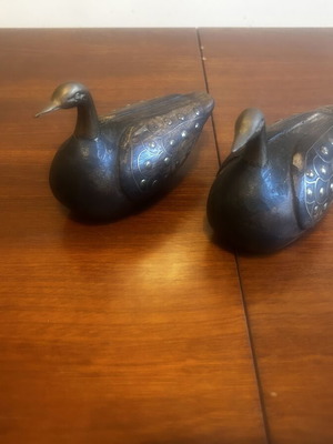 Vintage handmade decorative wooden ducks with metal details