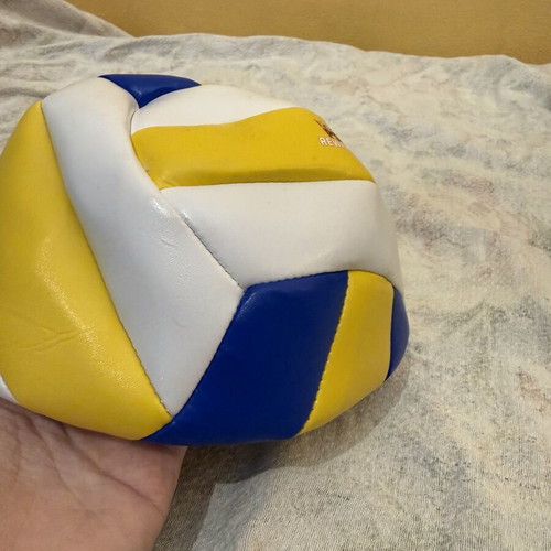 Volleyball ball new, deflated, tricolor blue yellow white