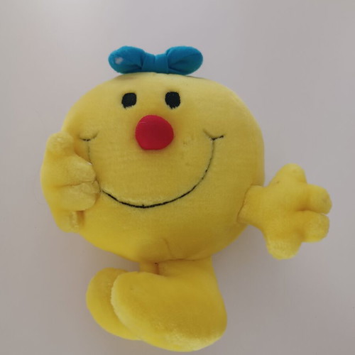 Yellow plush smiley with blue bow