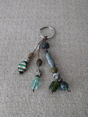 Handmade keychain like new with beads in green and turquoise shades