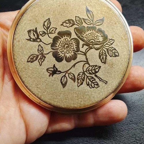 Vintage powder compact with mirror
