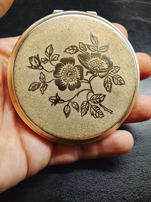 Vintage powder compact with mirror