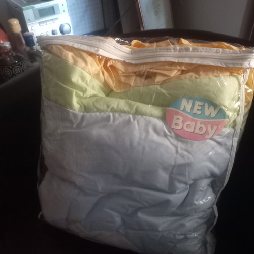 New Baby hypoallergenic baby quilt with ruffles