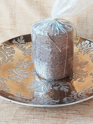 Decorative plate used gold with embossed designs and candle gift