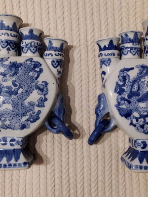 Chinese porcelain candle holders like new with blue dragon designs